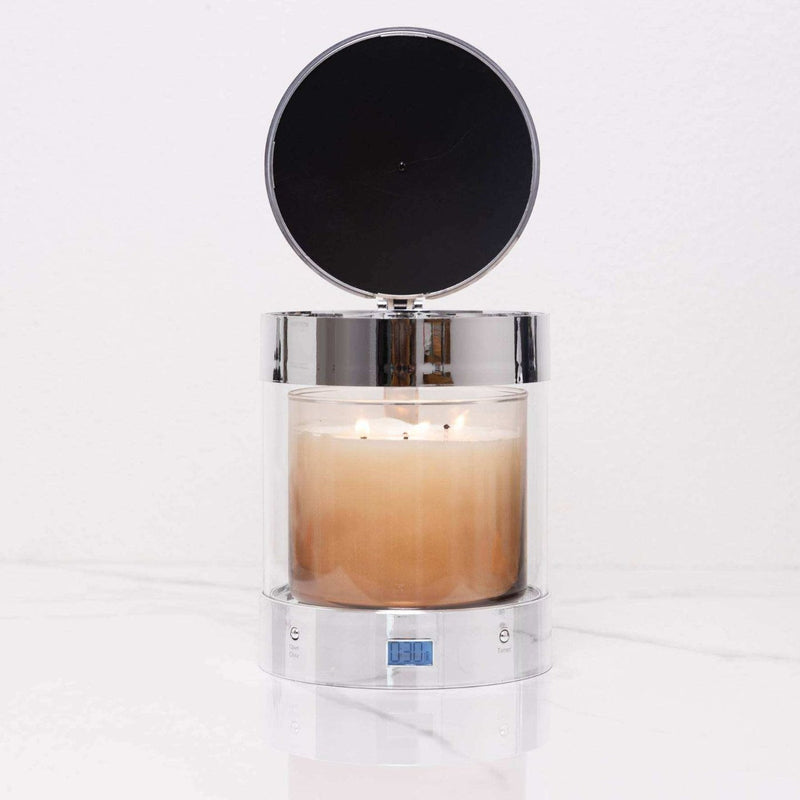Silver Gloss ALEC with its lid open over a lit three-wick jar candle