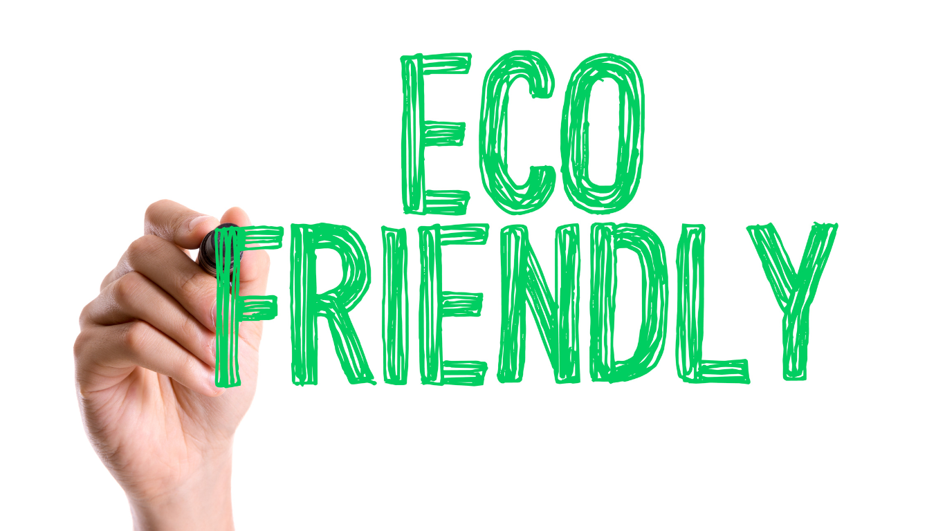 Hand writing "Eco Friendly" in green